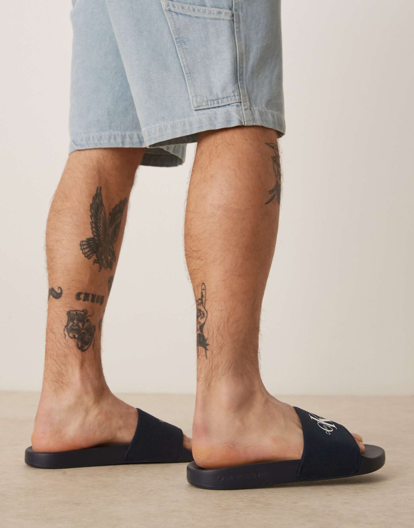 Calvin Klein Jeans large logo sliders in navy