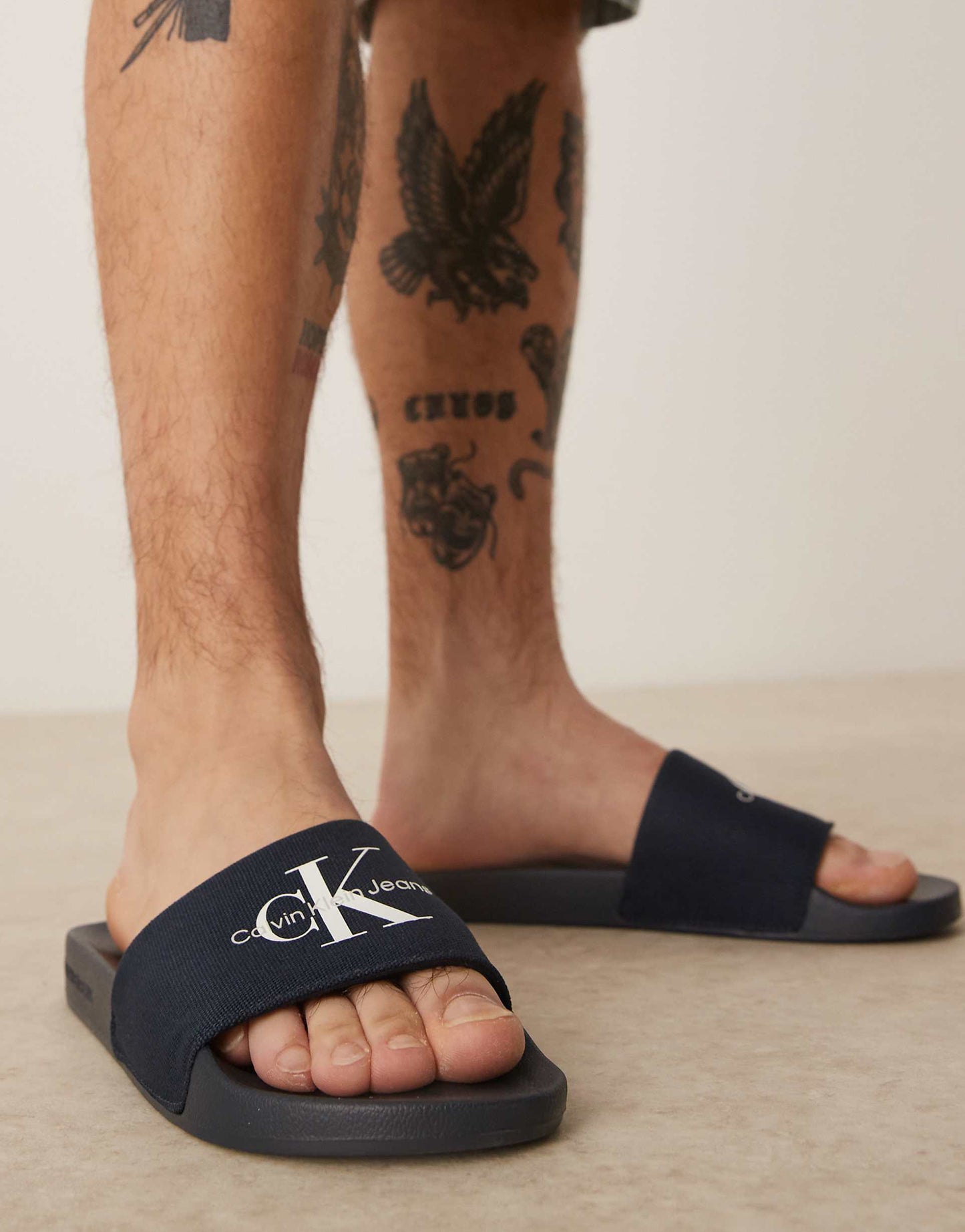 Calvin Klein Jeans large logo sliders in navy