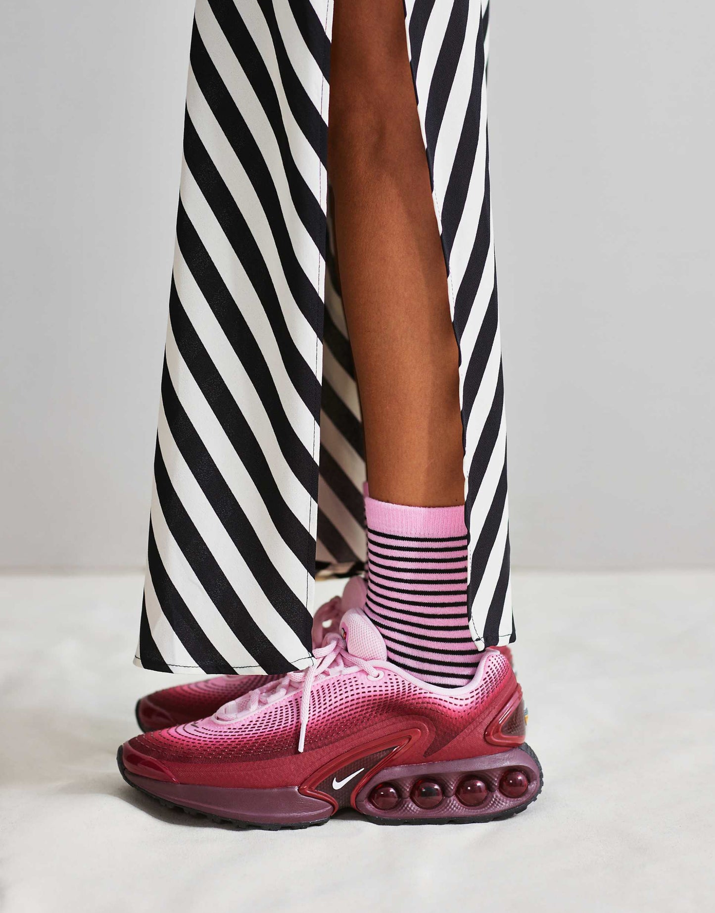 Nike Air Max DN trainers in dark burgundy