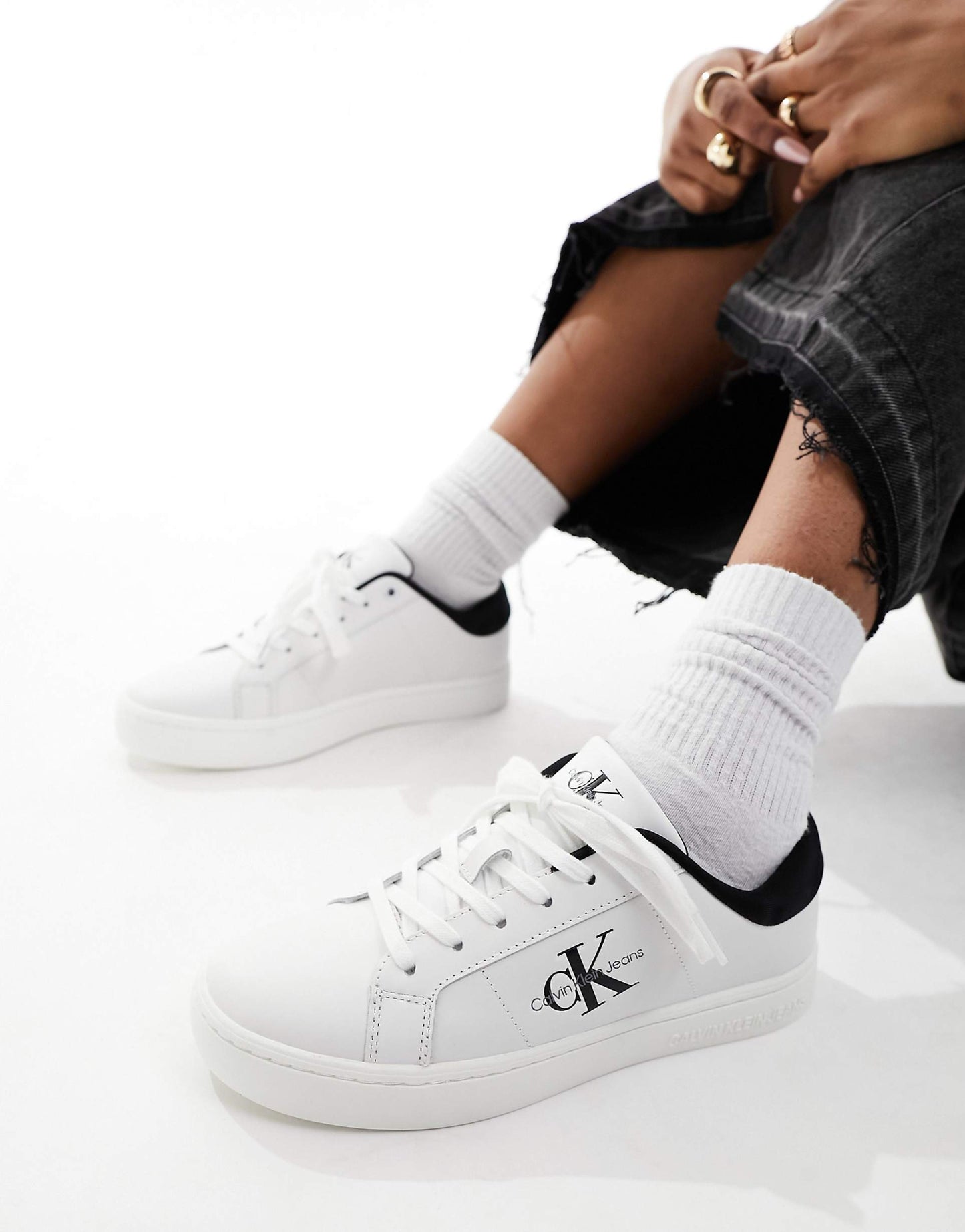 Calvin Klein leather trainers in white & black